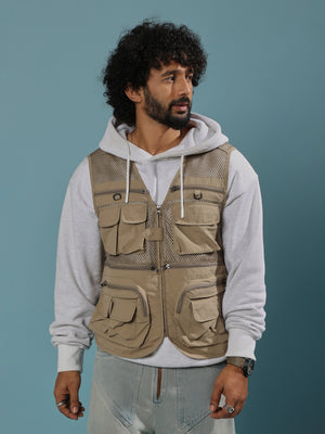 men's biege zippered cargo vest with utility pockets and zip closure.
trendy outfits for men