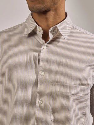 men's oversized olive brown stripped shirt with full sleeve and chest pocket made from 100% cotton.
pure cotton shirts for men
oversized shirts for men