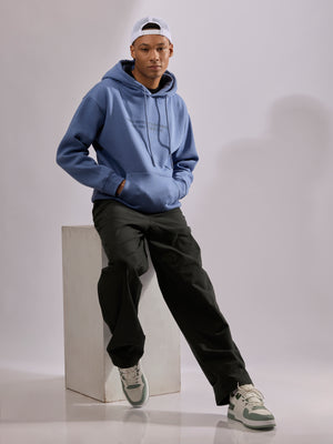men's light blue long sleeve hoodie with minimal print, cotton and polyster blended.
