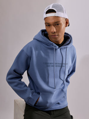 men's light blue long sleeve hoodie with minimal print, cotton and polyster blended.