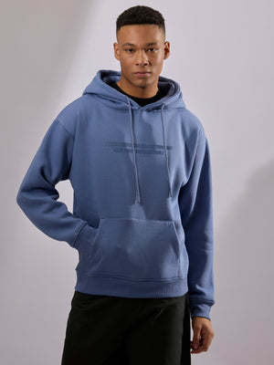 men's light blue long sleeve hoodie with minimal print, cotton and polyster blended.