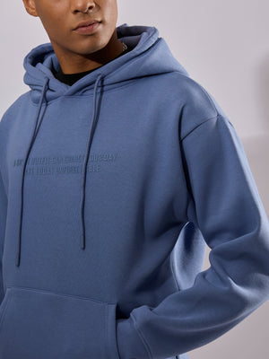 men's light blue long sleeve hoodie with minimal print, cotton and polyster blended.