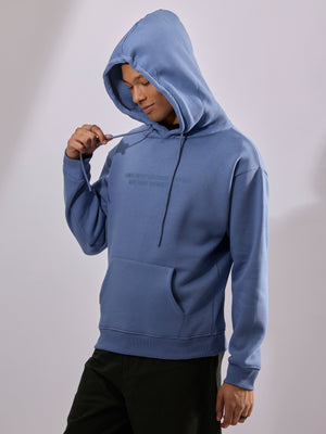 men's light blue long sleeve hoodie with minimal print, cotton and polyster blended.