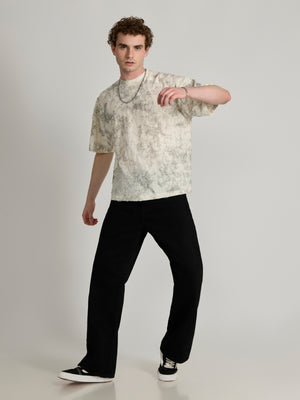 man wearing a Distressed Oversized T-Shirt - black