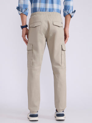 Men's jogger pant in beige with elasticated drawstring