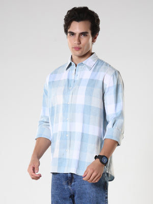 Men's casual sky blue checkered cotton shirt with full sleeves, relaxed fit – paired with denim jeans