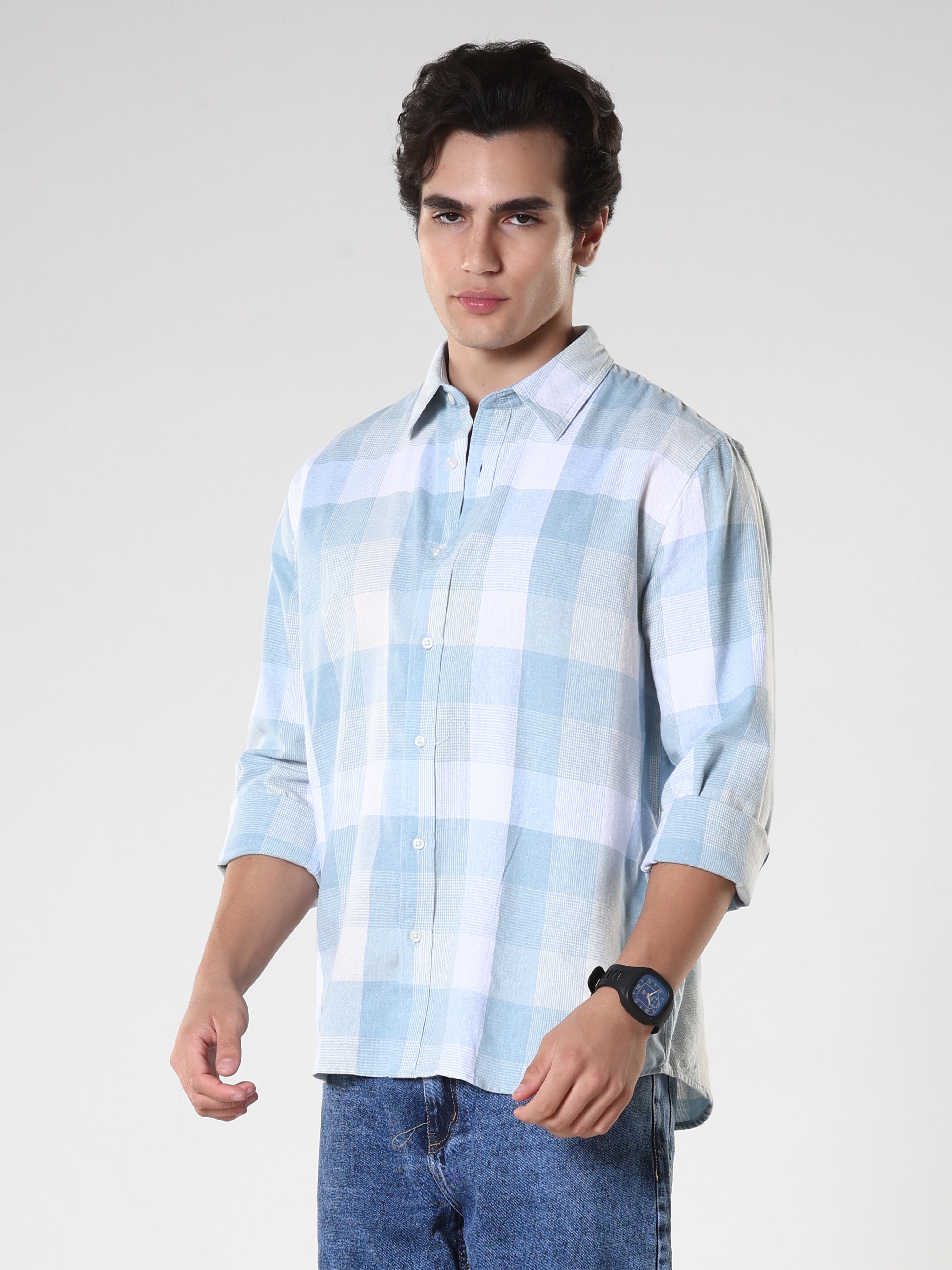 Men's casual sky blue checkered cotton shirt with full sleeves, relaxed fit – paired with denim jeans