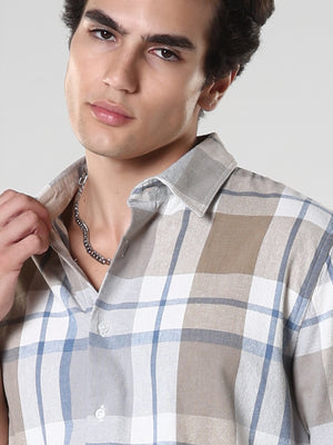 Men's casual brown and blue checkered cotton shirt with full sleeves, relaxed fit – paired with blue denim jeans