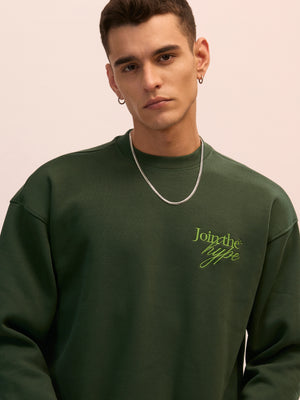 Men's forest green full sleeve fleece sweater tee with front chest print and soft winterwear.
