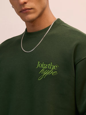 Men's forest green full sleeve fleece sweater tee with front chest print and soft winterwear.