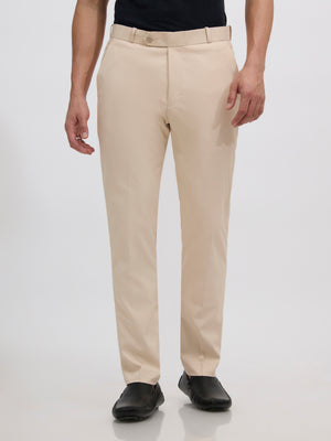 men's sand beige skinny fit trousers blended with polyster and spandex - paired with a black top and black shoes