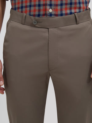 men's cement gray skinny fit trousers blended with polyster and spandex - paired with a black top and black shoes