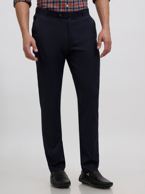men's navy blue skinny fit trousers blended with polyster and spandex - paired with a black top and black shoes