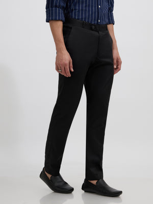 men's black skinny fit trousers blended with polyster and spandex - paired with a black top and black shoes