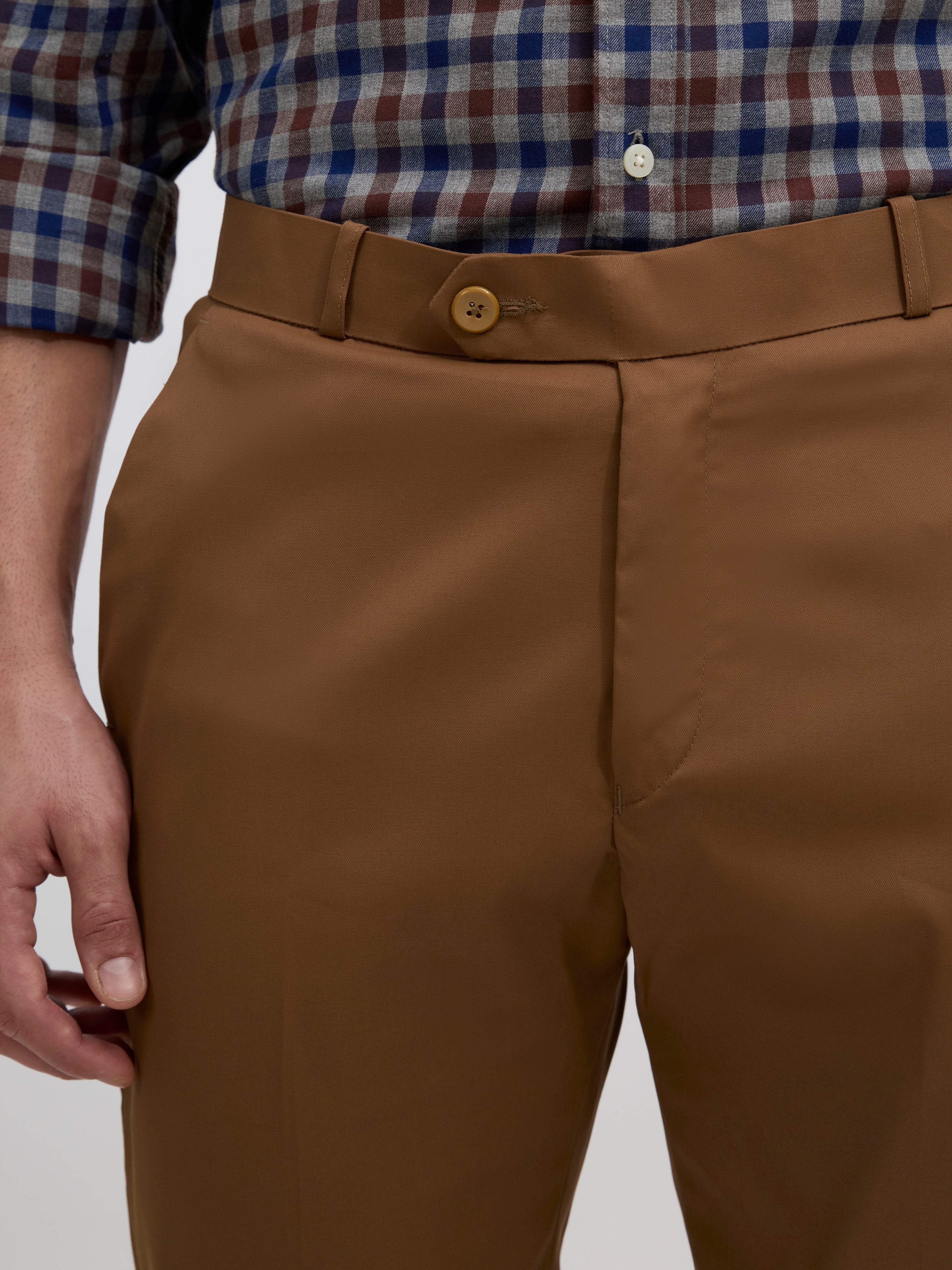 men's coffee brown skinny fit trousers blended with polyster and spandex - paired with a black top and black shoes