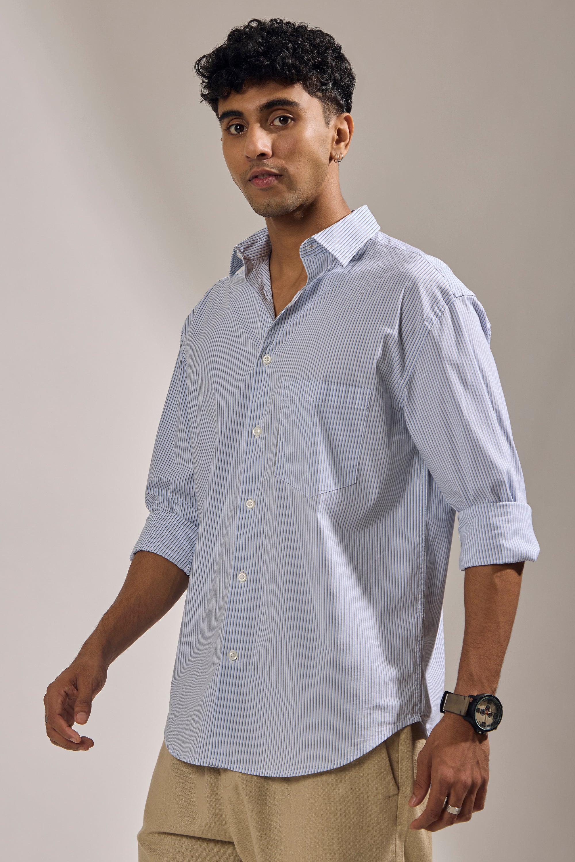 men's oversized olive blue stripped shirt with full sleeve and chest pocket made from 100% cotton.
pure cotton shirts for men
oversized shirts for men