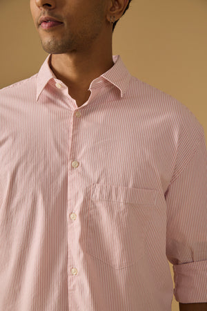 men's oversized pink stripped shirt with full sleeve and chest pocket made from 100% cotton.
pure cotton shirts for men
oversized shirts for men