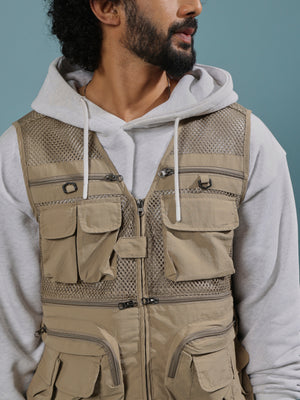 men's biege zippered cargo vest with utility pockets and zip closure
trendy outfits for men