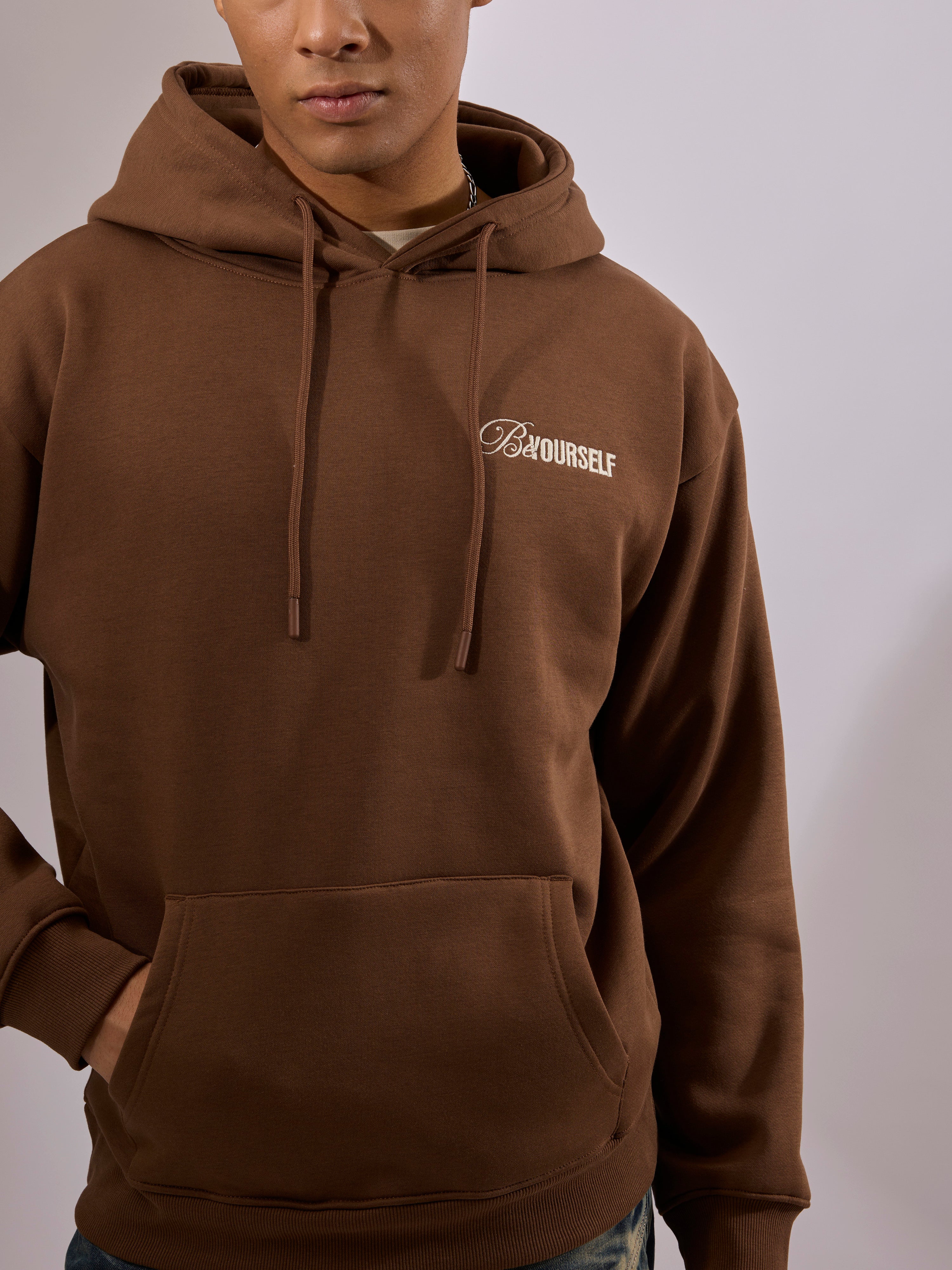 men's brown long sleeve hoodie with minimal print, cotton and polyster blended.