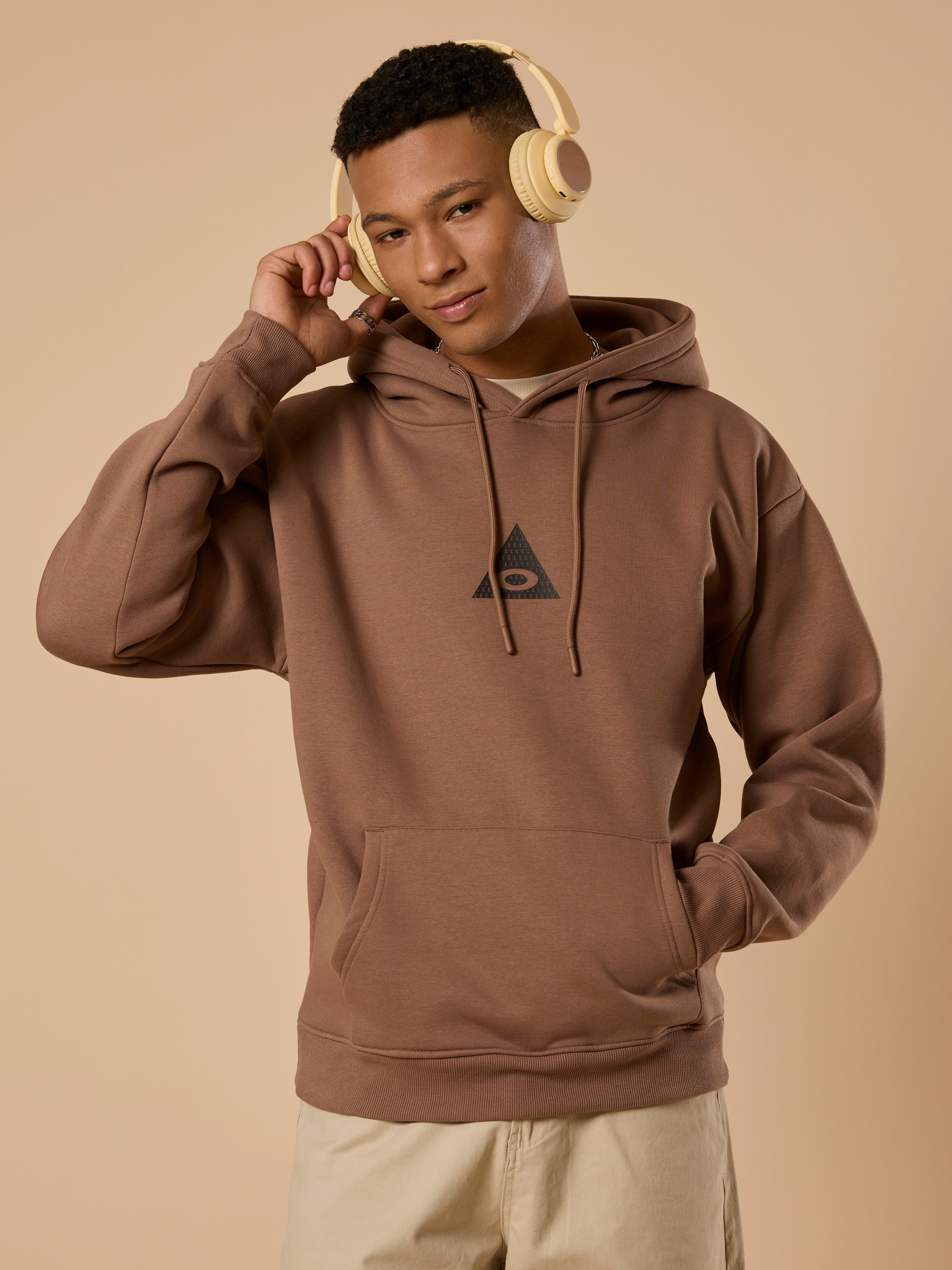 men's light brown long sleeve hoodie with minimal print, cotton and polyster blended.