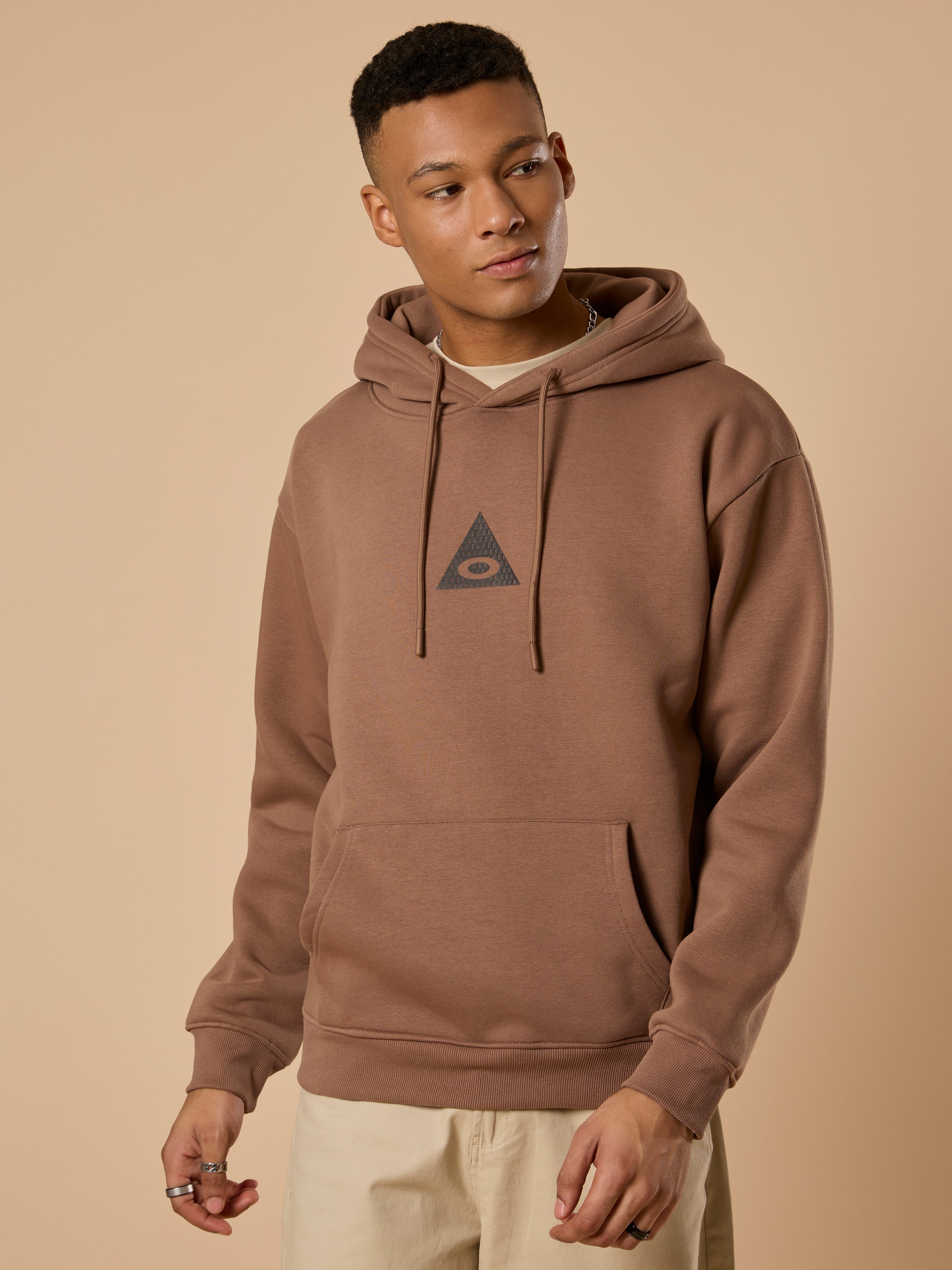 men's light brown long sleeve hoodie with minimal print, cotton and polyster blended.