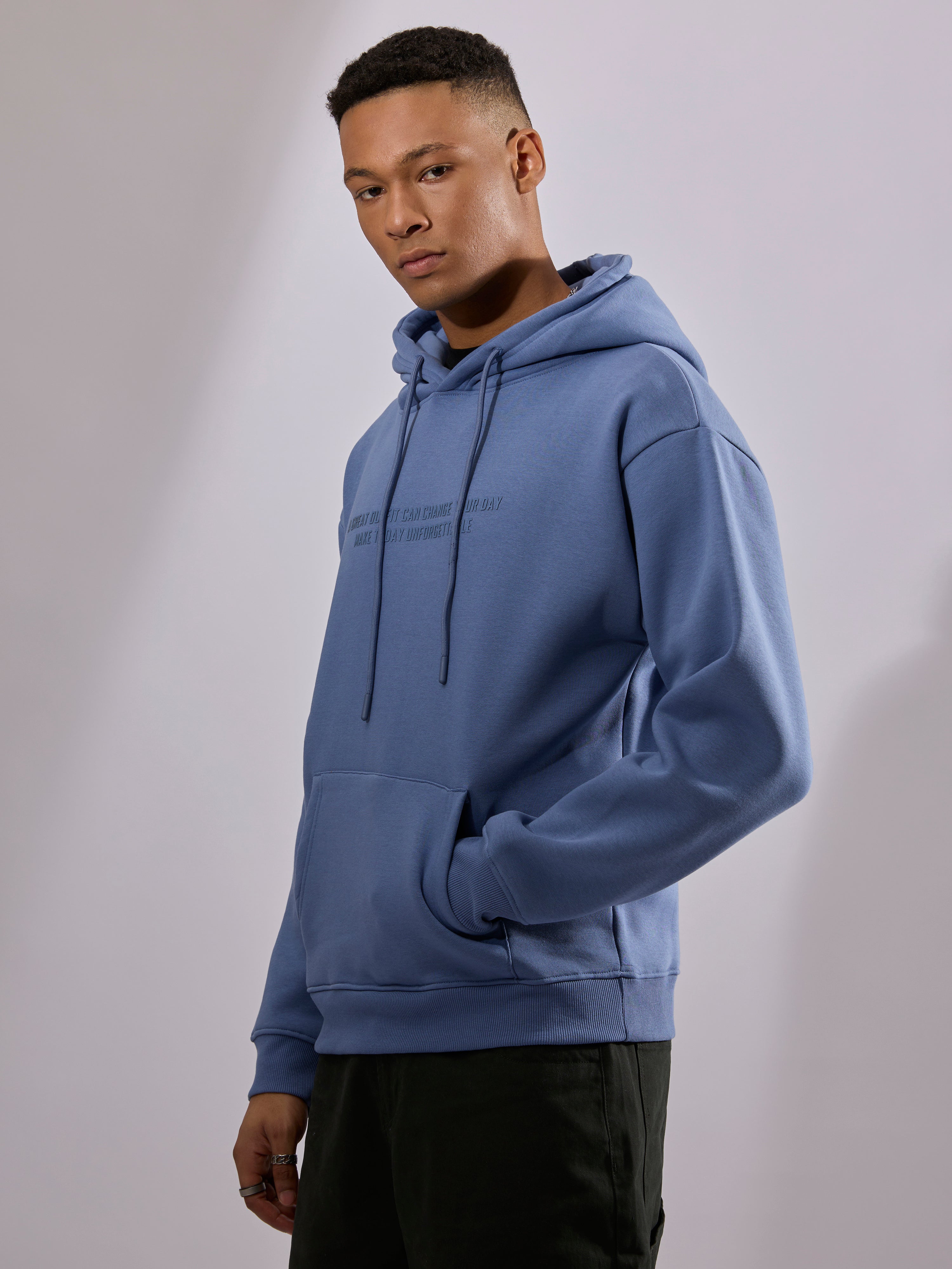 men's light blue long sleeve hoodie with minimal print, cotton and polyster blended.