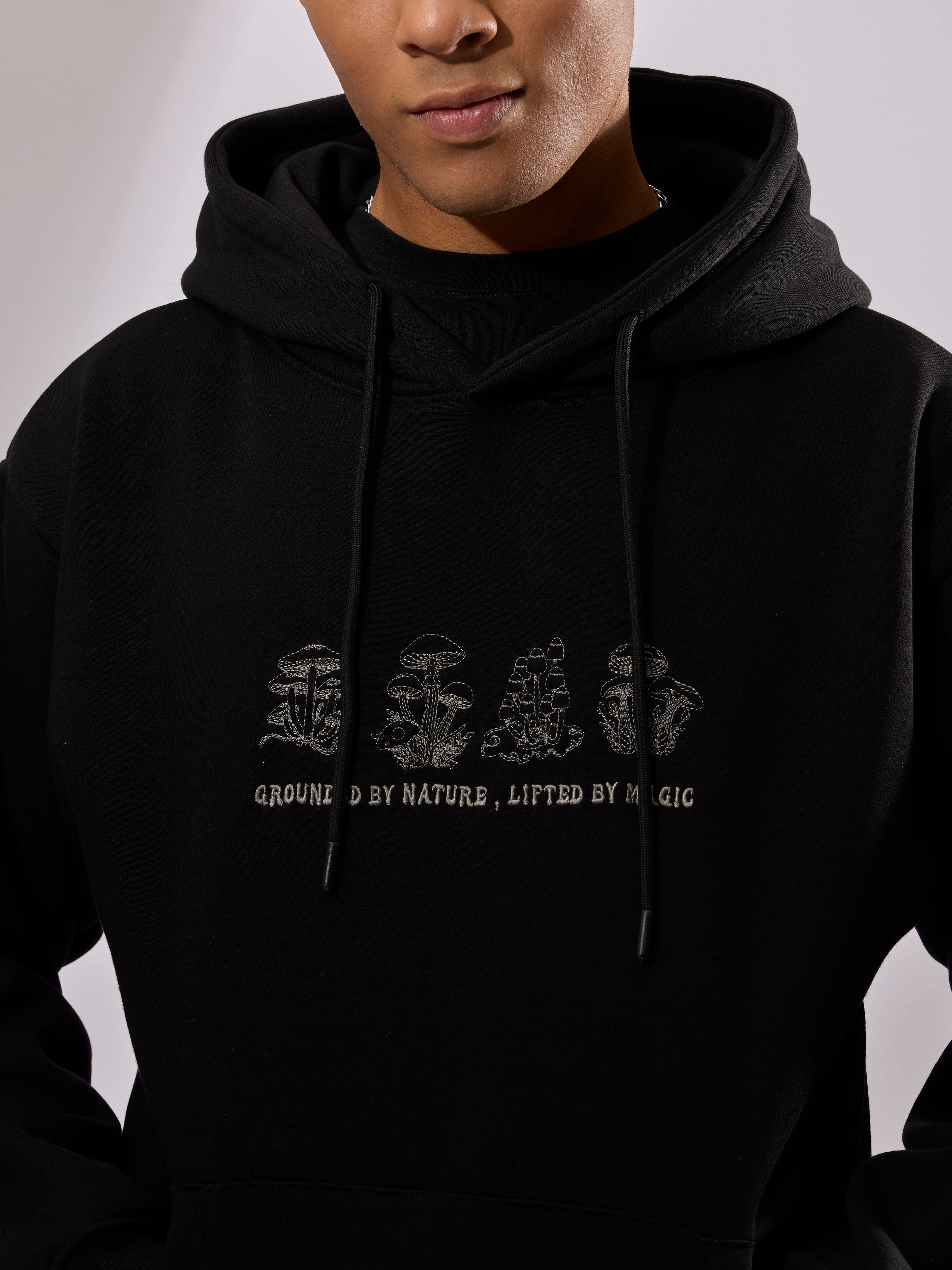 men's black long sleeve hoodie with minimal print, cotton and polyster blended.
