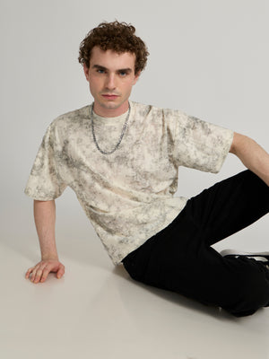 man wearing a Distressed Oversized T-Shirt - black