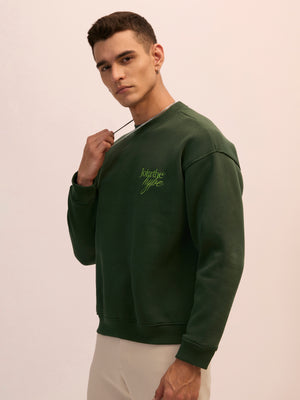 Men's forest green full sleeve fleece sweater tee with front chest print and soft winterwear.