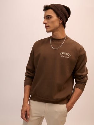 Men's choclate brown full sleeve fleece sweater tee with front chest print and soft winterwear.