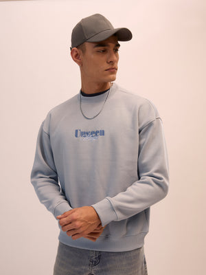 Men's sand gray full sleeve fleece sweater tee with front chest print and soft winterwear.