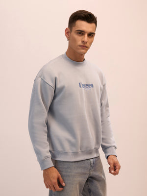 Men's sand gray full sleeve fleece sweater tee with front chest print and soft winterwear.