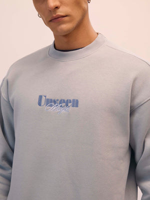 Men's sand gray full sleeve fleece sweater tee with front chest print and soft winterwear.