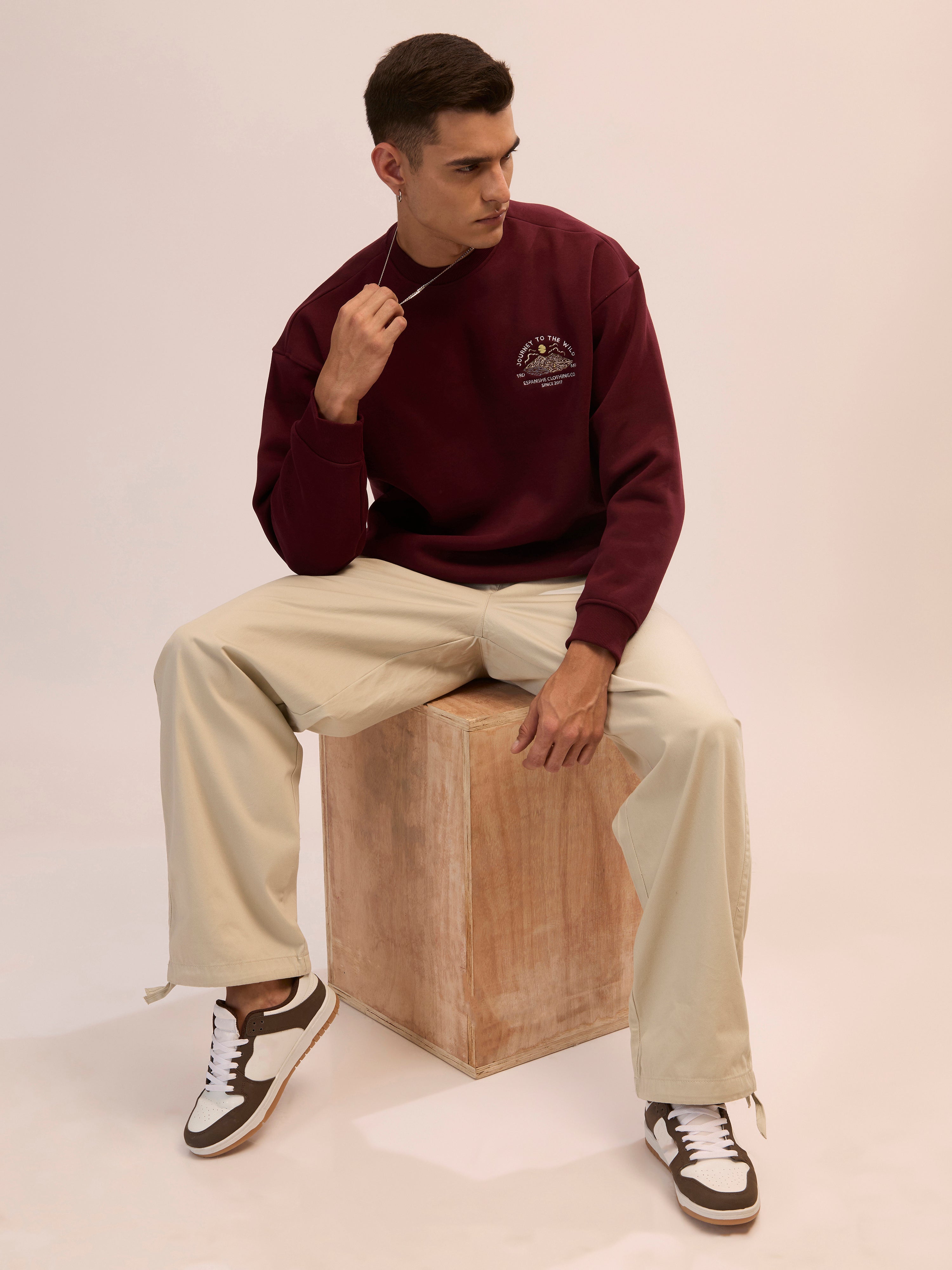 Men's maroon full sleeve fleece sweater tee with front chest print and soft winterwear.