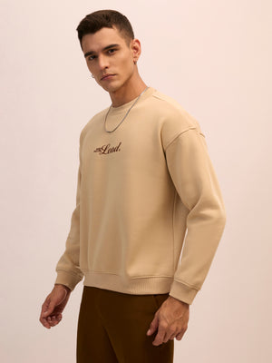 Men's camel beige full sleeve fleece sweater tee with front chest print and soft winterwear.