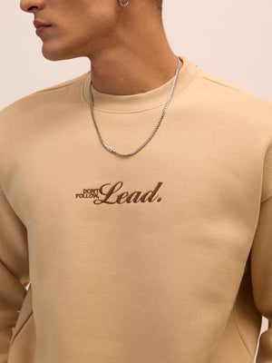 Men's camel beige full sleeve fleece sweater tee with front chest print and soft winterwear.