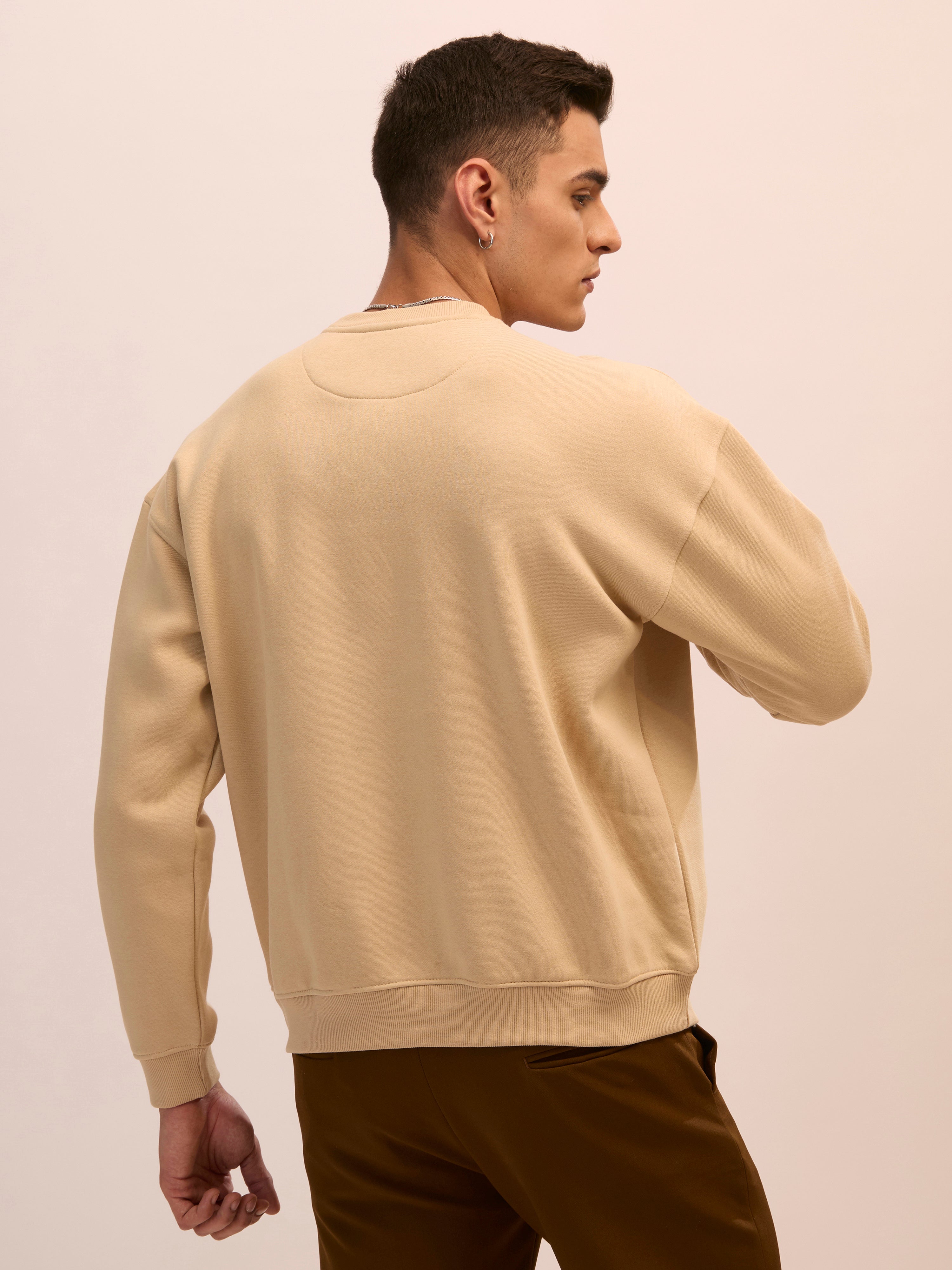 Men's camel beige full sleeve fleece sweater tee with front chest print and soft winterwear.
