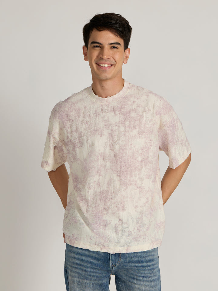 man wearing a Distressed Oversized T-Shirt - Pink
