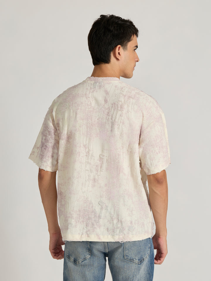 man wearing a Distressed Oversized T-Shirt - Pink