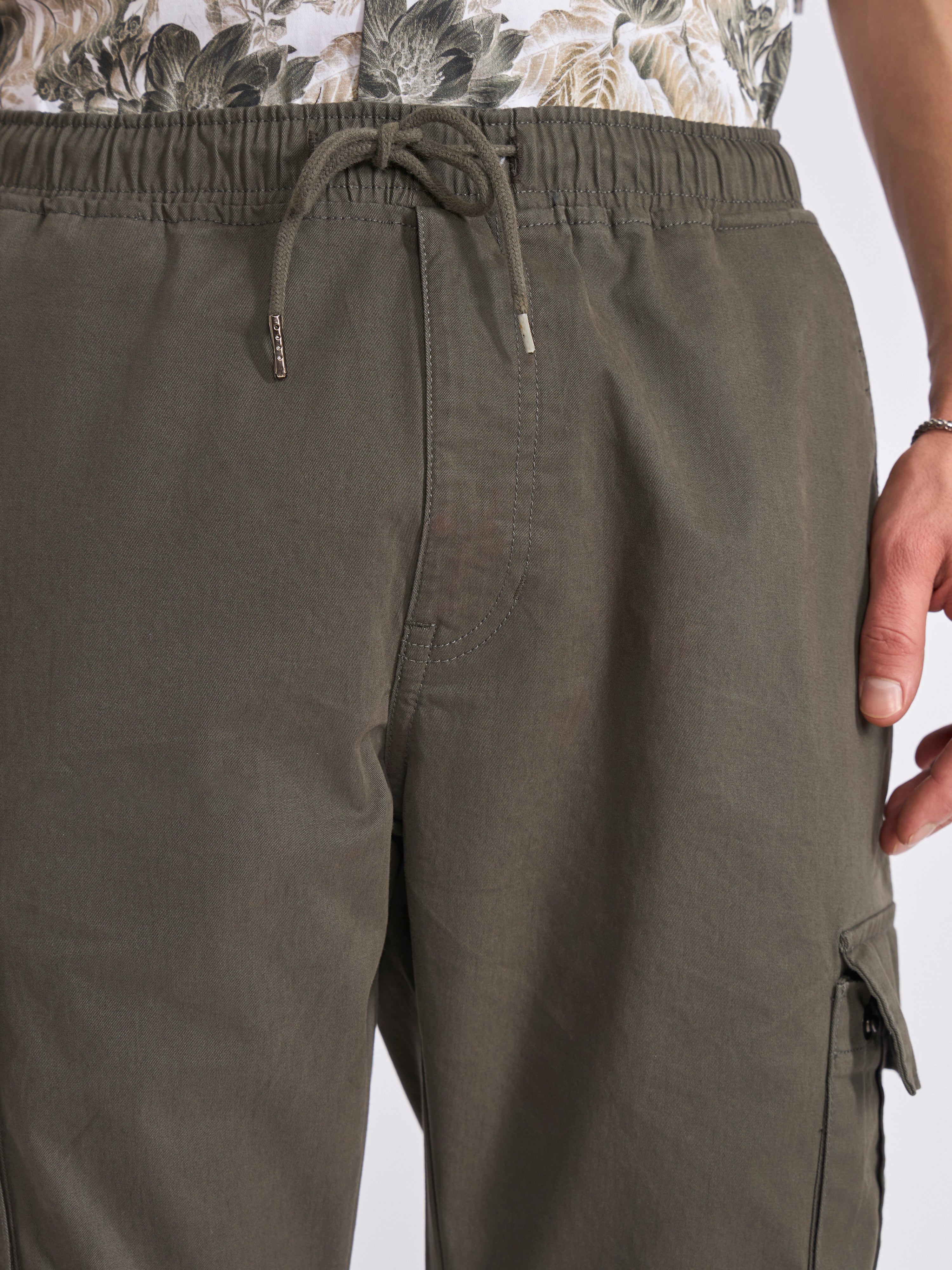 Men's jogger pant in olive green with elasticated drawstring