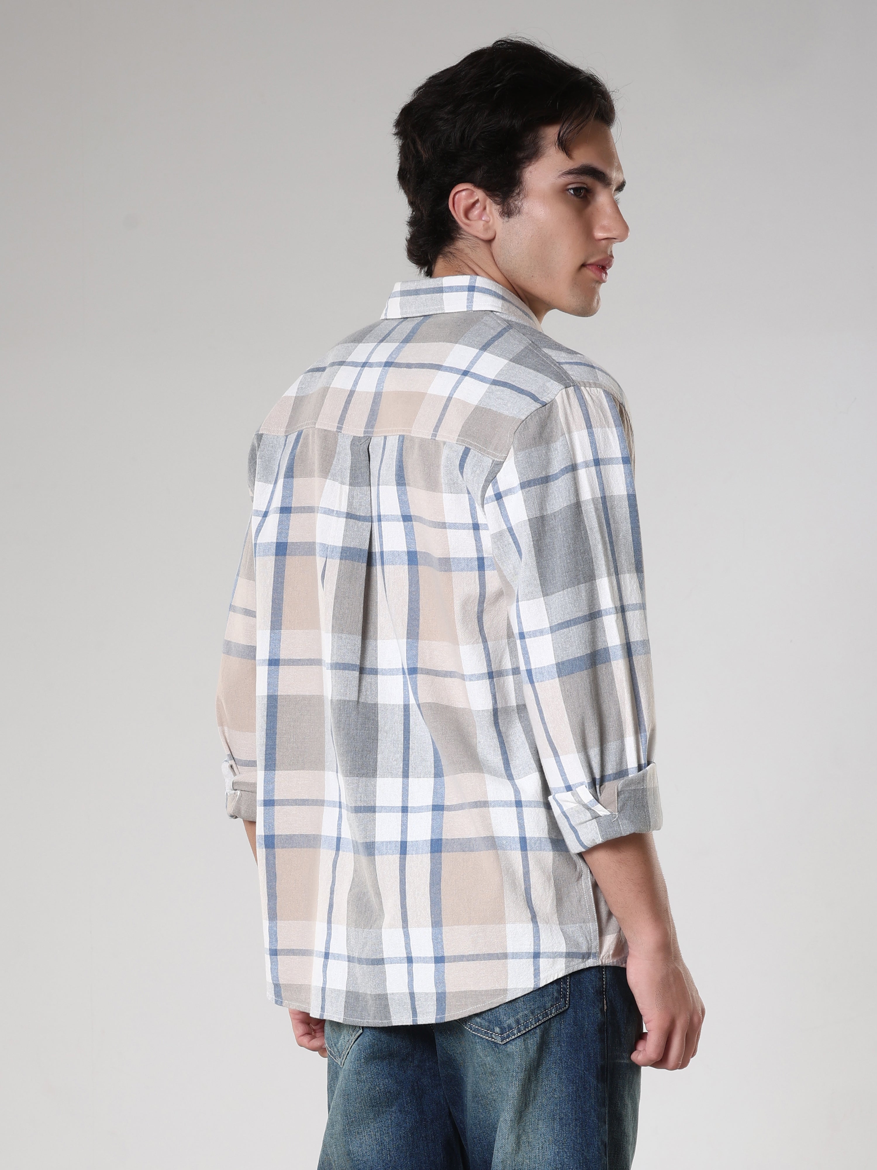 Men's casual beige and blue checkered cotton shirt with full sleeves, relaxed fit – paired with blue denim jeans