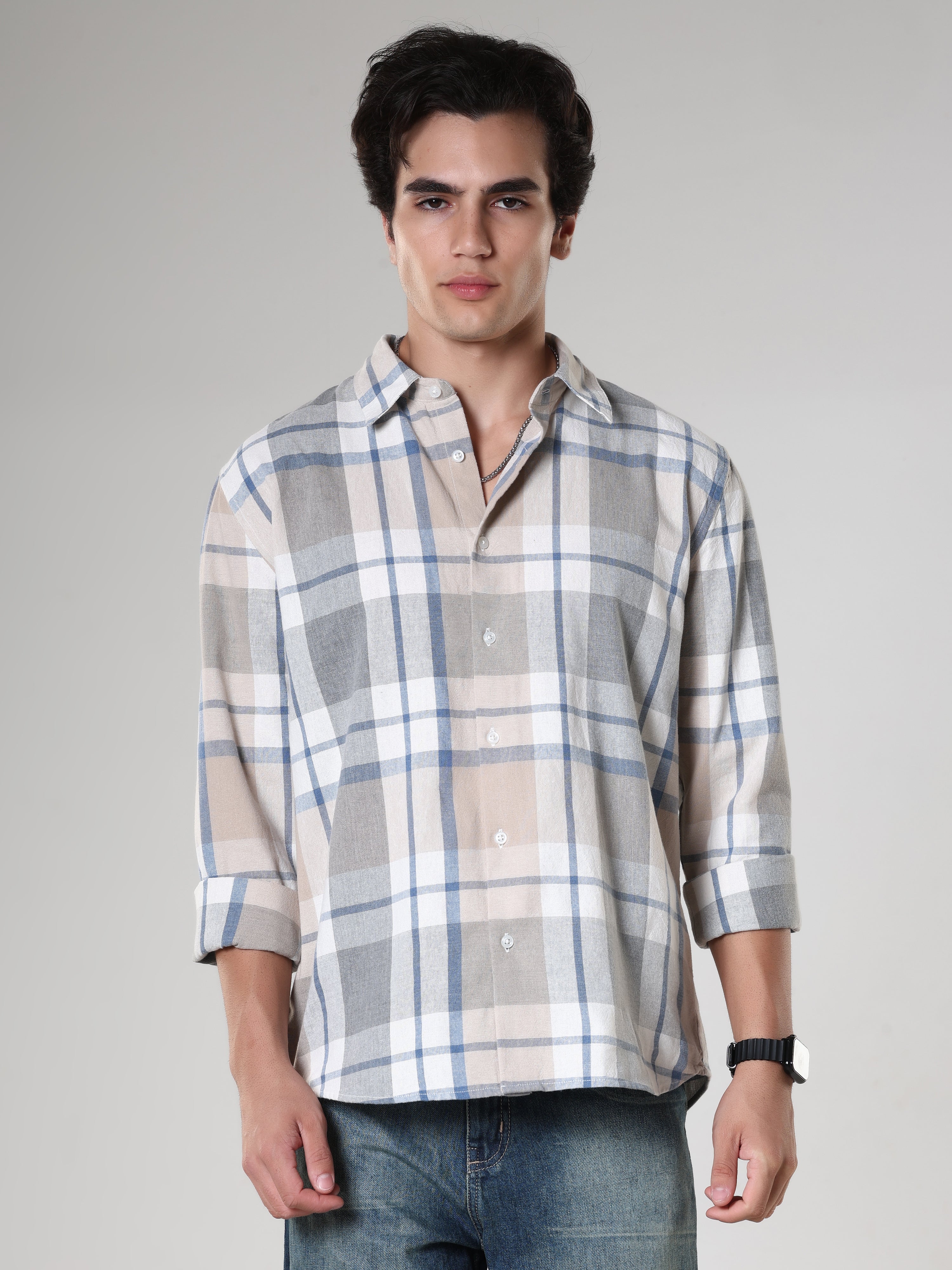 Men's casual beige and blue checkered cotton shirt with full sleeves, relaxed fit – paired with blue denim jeans