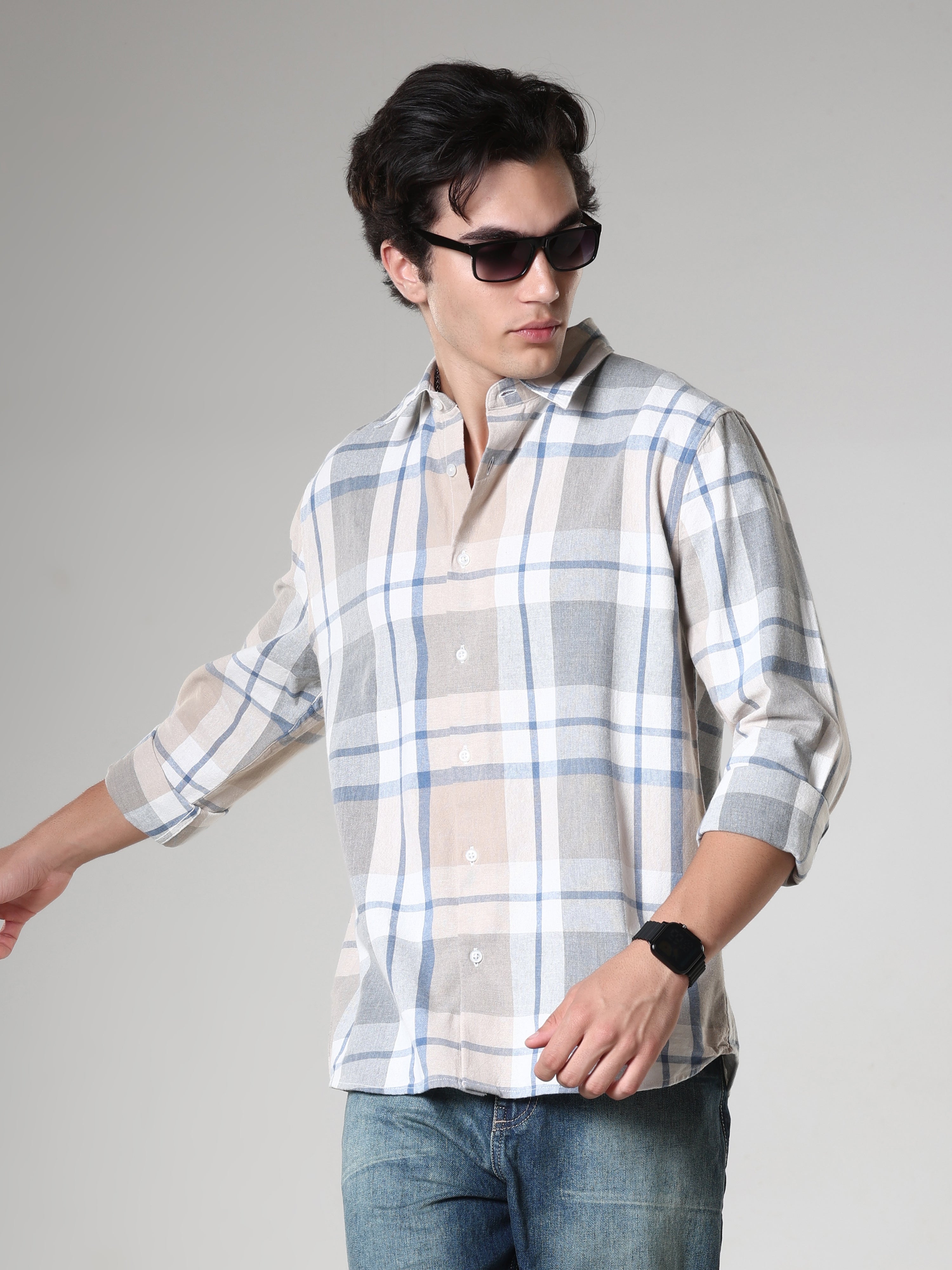 Men's casual beige and blue checkered cotton shirt with full sleeves, relaxed fit – paired with blue denim jeans