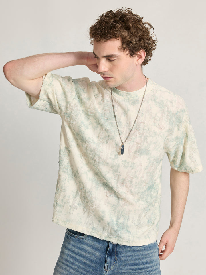 man wearing a Distressed Oversized T-Shirt - green