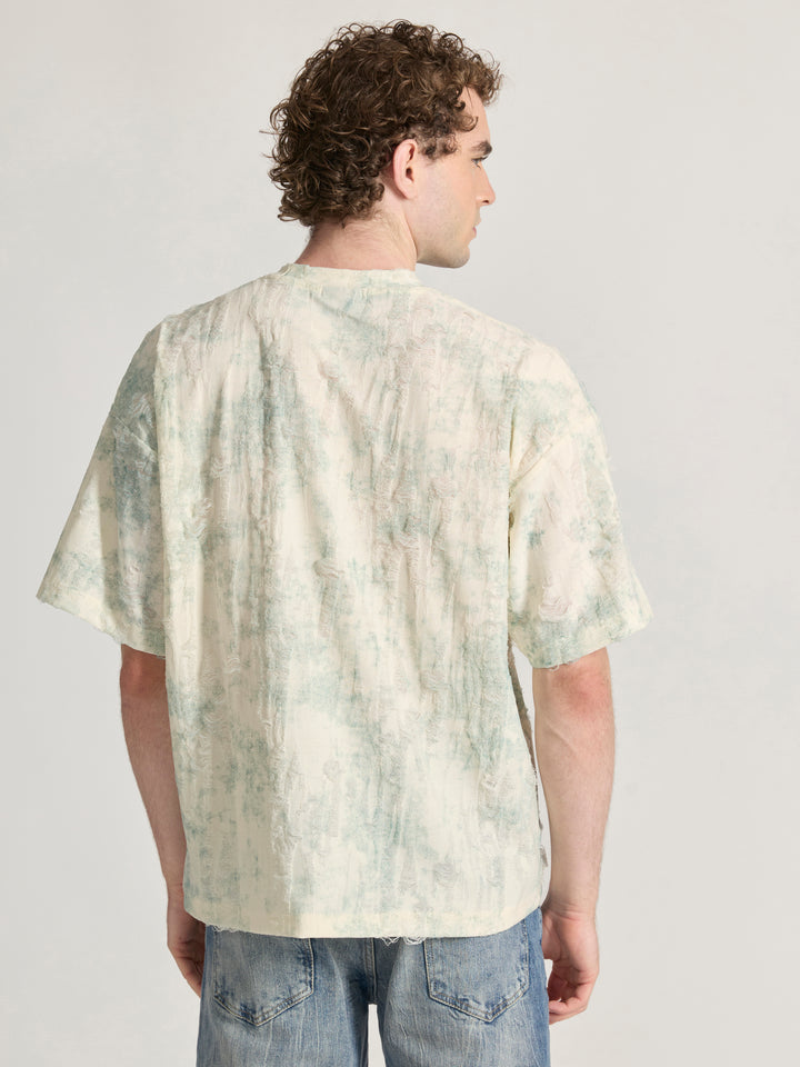 man wearing a Distressed Oversized T-Shirt - green