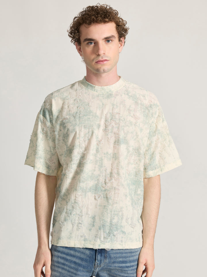 man wearing a Distressed Oversized T-Shirt - green