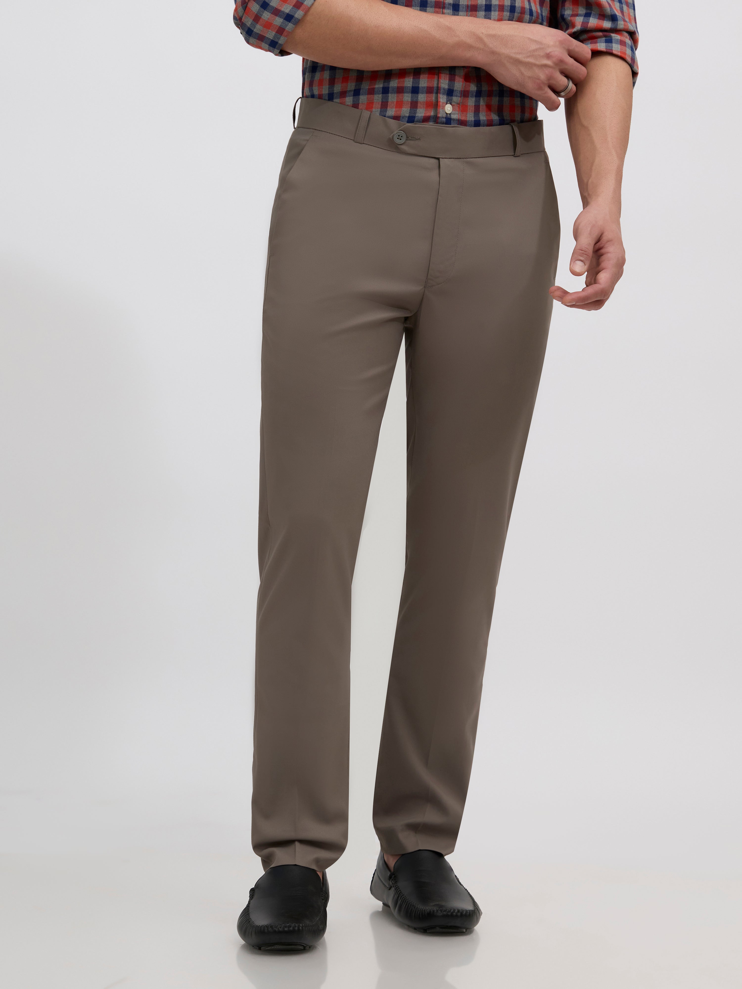 men's cement gray skinny fit trousers blended with polyster and spandex - paired with a black top and black shoes