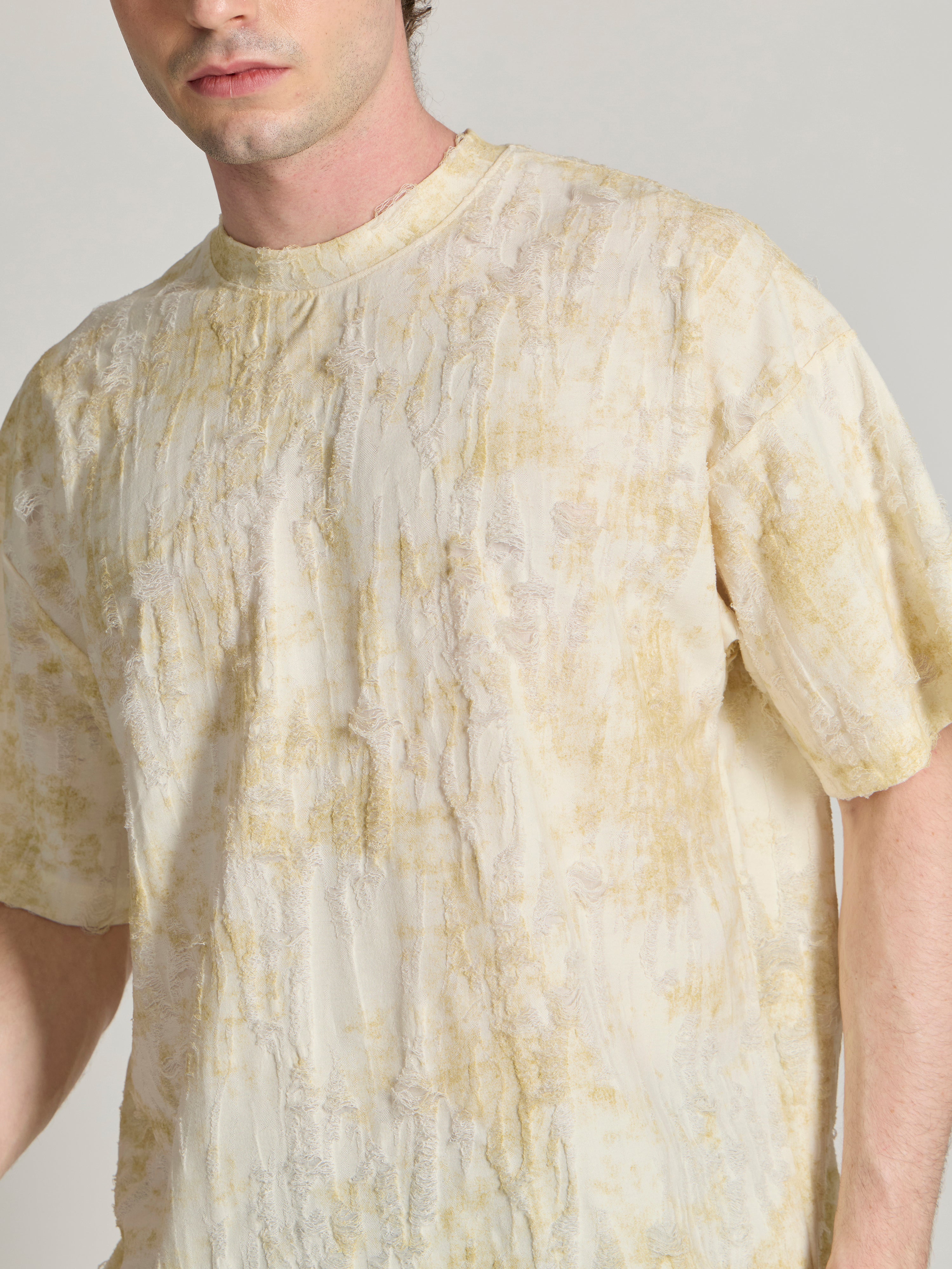 man wearing a Distressed Oversized T-Shirt - yellow